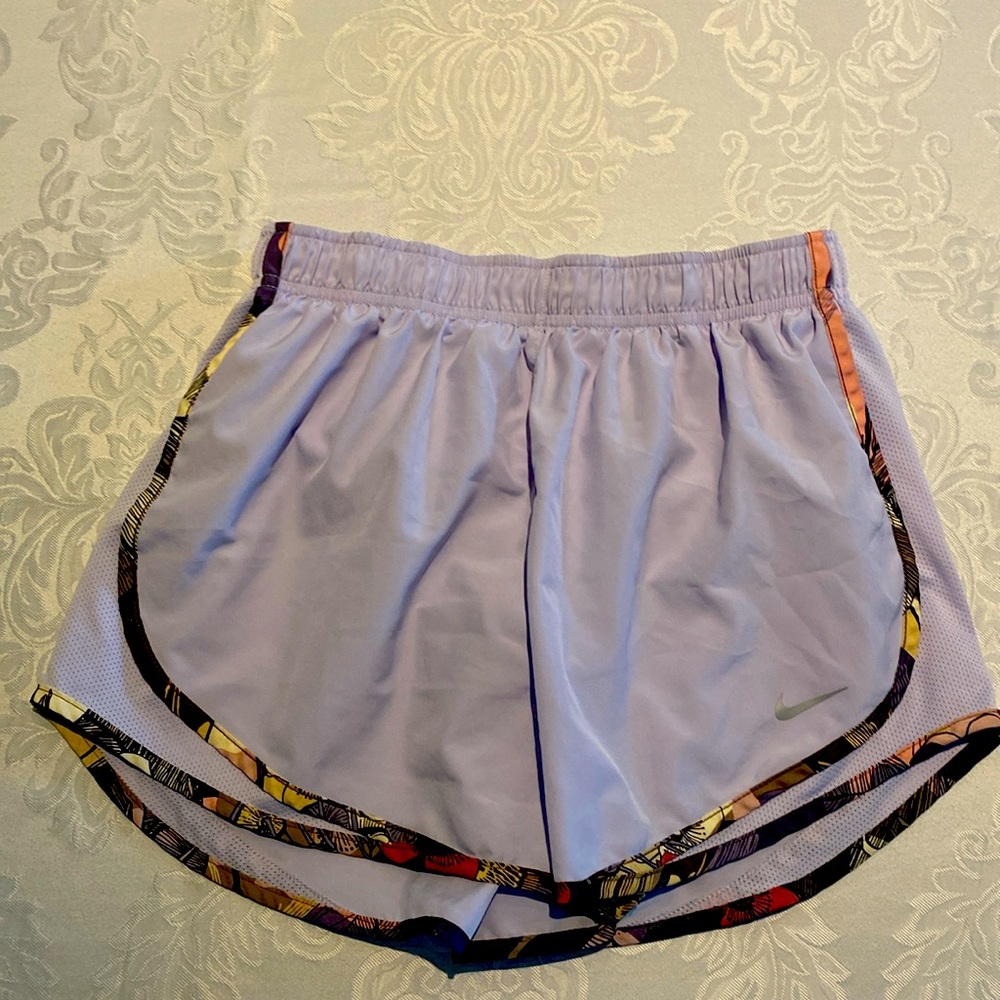 Nike dri fit size M athletic running shorts. Purple with colorful accent